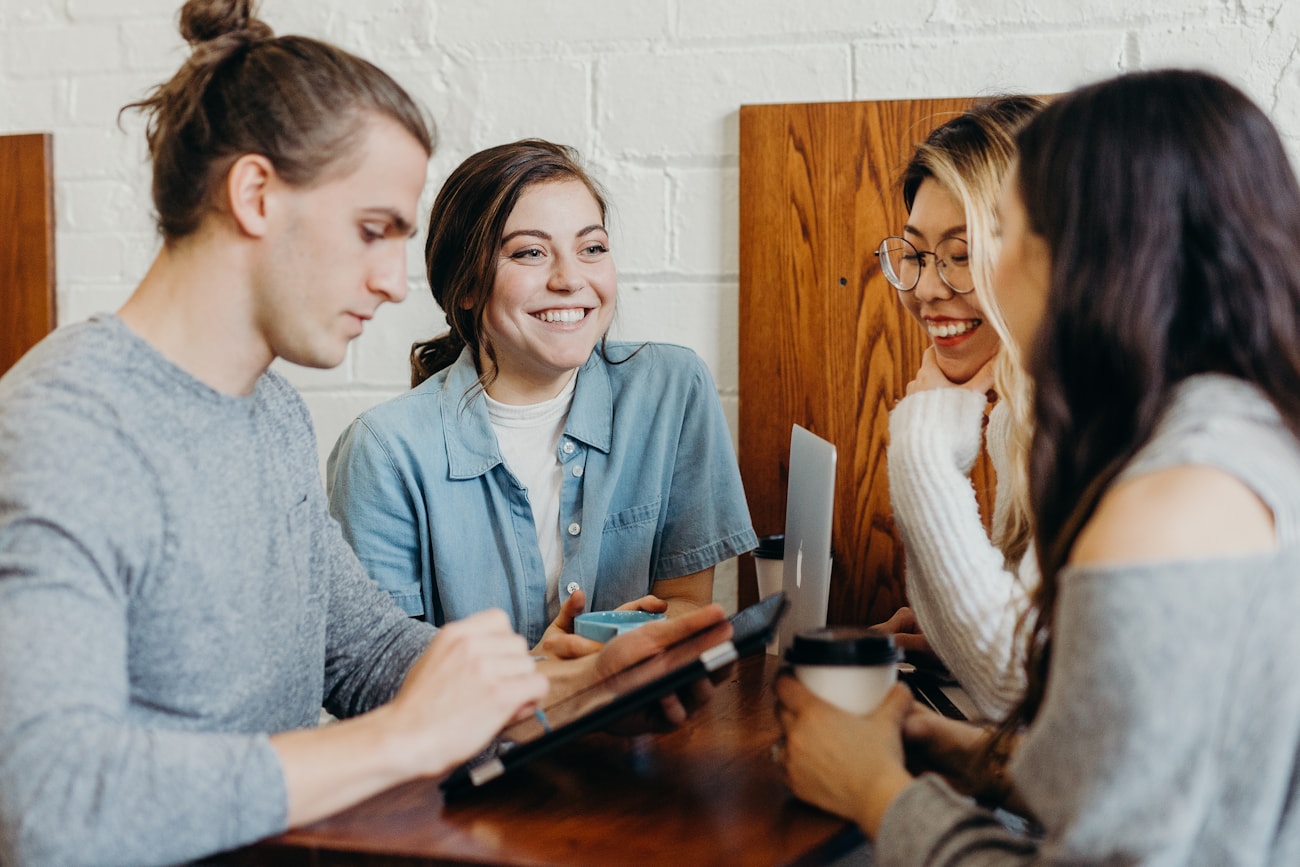 Kyzen team in conversation with a client
